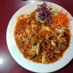 The arroz con pollo at Sol de Mexico is chicken and rice cooked with mushrooms, pico de gallo and tomato juice. (Sara Bruestle / The Herald)