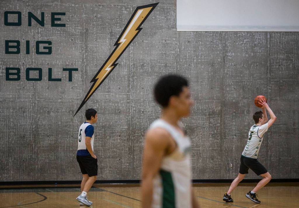 Players run through drills during practice on Wednesday, Feb. 26, 2020 in Marysville, Wash. (Olivia Vanni / The Herald)