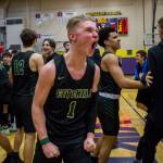 Marysville Getchells Josiah Koellmer celebrates after the Chargers beat Mount Tahoma 54-51 to advance to the 3A Hardwood Classic on Friday in Puyallup. (Olivia Vanni / The Herald)
