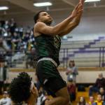 Marysville Getchells Malakhi Knight elevates for a layup during a 3A state regional game against Mount Tahoma on Friday in Puyallup. (Olivia Vanni / The Herald)