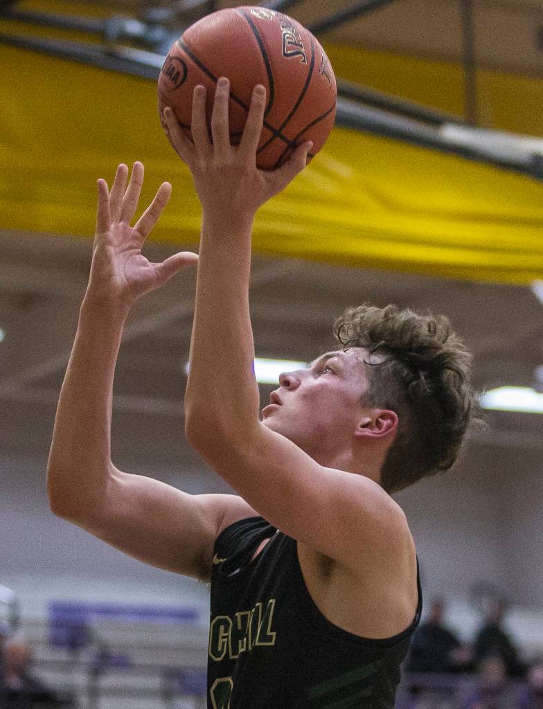 Marysville Getchells Alex Owens elevates for a layup during a 3A state regional game against Mount Tahoma on Friday in Puyallup. (Olivia Vanni / The Herald)