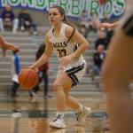 Arlingtons Allison DeBerry looks for an open teammate during a 3A state regional game against Lake Washington on Saturday in Shoreline. (Olivia Vanni / The Herald)