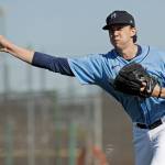 Mariners pitcher Logan Gilbert throws during spring training practice on Feb. 13, 2020, in Peoria, Ariz. (AP Photo/Charlie Riedel)