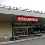 EvergreenHealth Medical Center is seen Saturday, where a person died of COVID-19, in Kirkland. State health officials announced the death Saturday, marking the first such reported death in the United States. (AP Photo/Elaine Thompson)