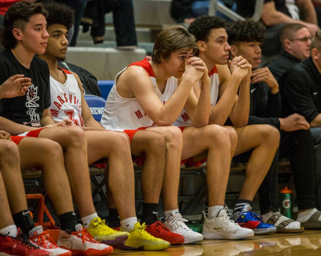 The Marysville Pilchuck bench watches nervously in overtime during the game against Kamiakan on Saturday, Feb. 29, 2020 in Shoreline, Wa. (Olivia Vanni / The Herald)