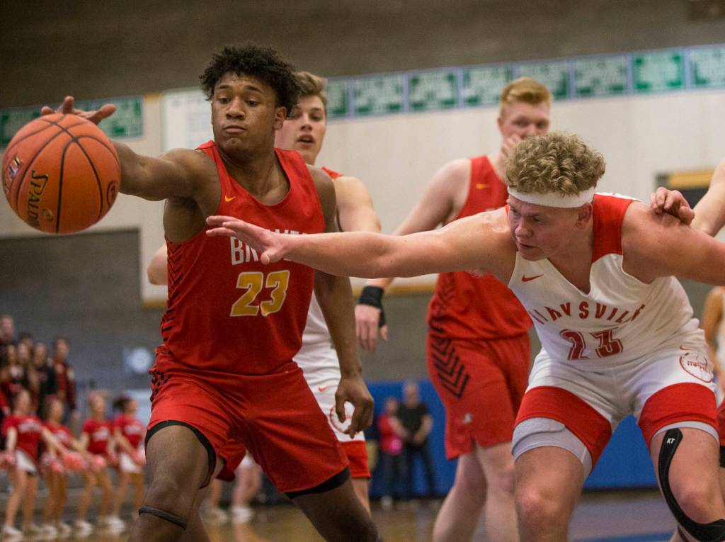 Kamiakins Messiah Jones outreaches Marysville Pilchucks Cameron Stordahl for the ball during the game against Kamiakan on Saturday, Feb. 29, 2020 in Shoreline, Wa. (Olivia Vanni / The Herald)