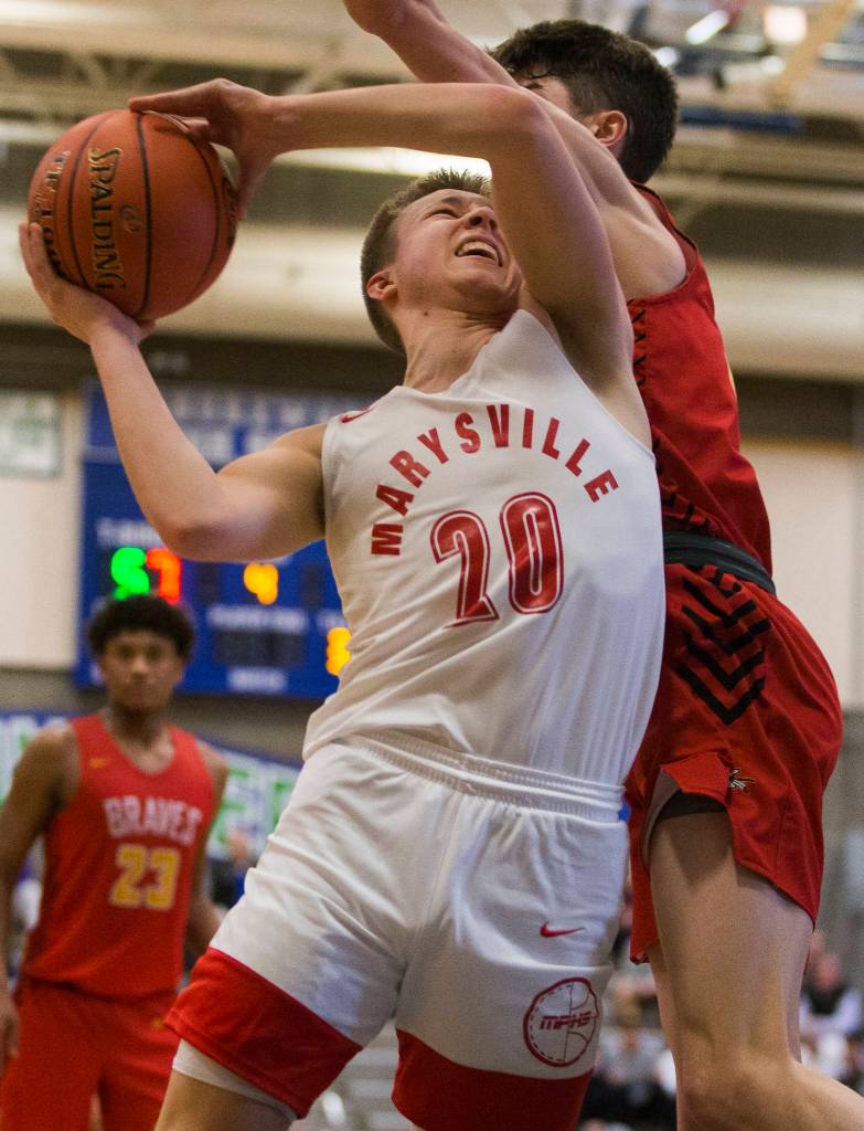 Marysville Pilchucks Luke Dobler drives to the hoop during the game against Kamiakan on Saturday, Feb. 29, 2020 in Shoreline, Wa. (Olivia Vanni / The Herald)