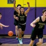 Marysville Getchells Malakhi Knight raises his arms and runs toward the bench with his teammates after beating Mount Tahoma on Friday, Feb. 28, 2020 in Puyallup. The Chargers make their first-ever trip to the Tacoma Dome on Wednesday. (Olivia Vanni / The Herald)