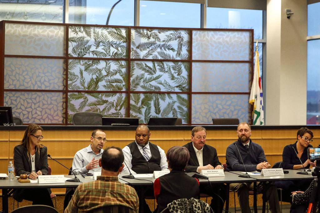 A special meeting of the Snohomish Health District Board of Health is convened at the Administration Builiding in Everett on Monday. (Kevin Clark / The Herald)