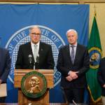 Gov. Jay Inslee (second from left) talks to the media about the states coronavirus efforts, Monday, in Olympia. He was joined by Health Secretary John Wiesman (far left), Robert Ezelle, director of the Washington State Department of Emergency Management (second from right) and state Superintendent of Public Instruction Chris Reykdal. (Rachel La Corte / Associated Press)