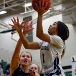 Glacier Peaks Aaliyah Collins (right) elevates for a layup during a 4A Wes-King Bi-District Tournament game against Inglemoor on Feb. 18, 2020, at Jackson High School in Mill Creek. (Kevin Clark / The Herald)