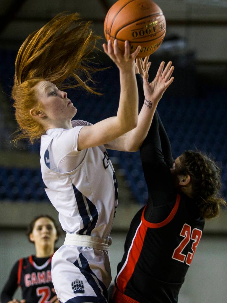 Glacier Peaks Kailyn Allison makes a layup over Camas Jalena Carlisle during the game at the Hardwood Classic on Wednesday, March 4, 2020 in Tacoma, Wa. (Olivia Vanni / The Herald)
