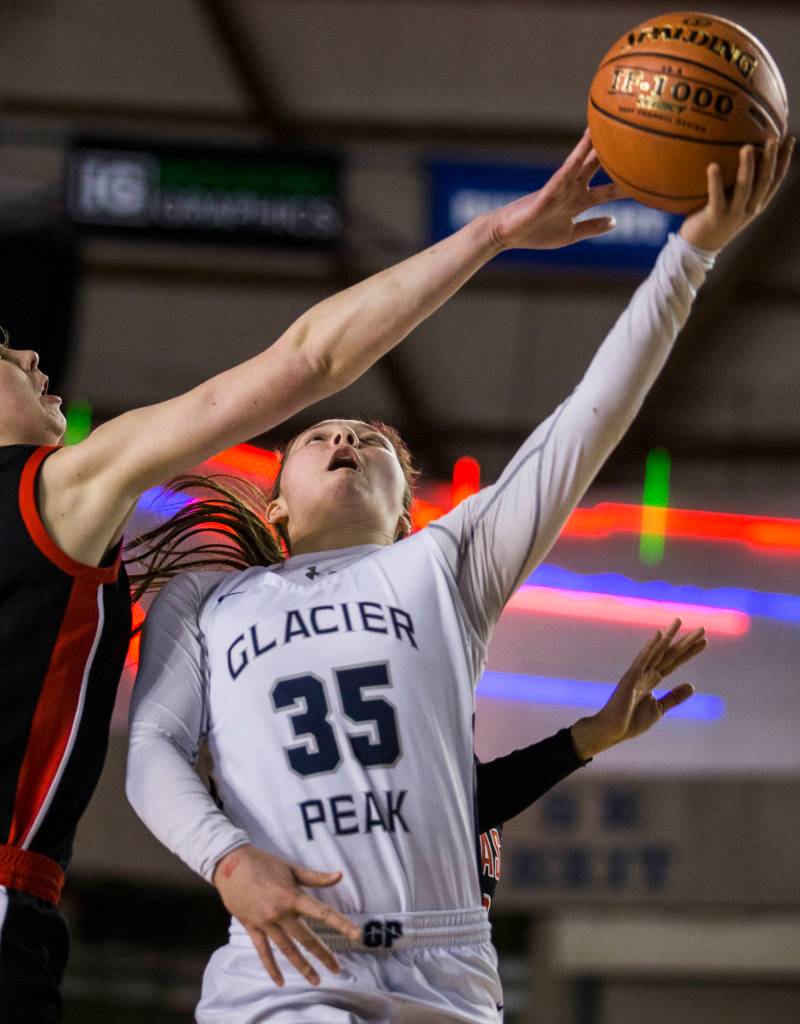 Glacier Peaks Maya Erling makes a layup during the game against Camas at the Hardwood Classic on Wednesday, March 4, 2020 in Tacoma, Wa. (Olivia Vanni / The Herald)