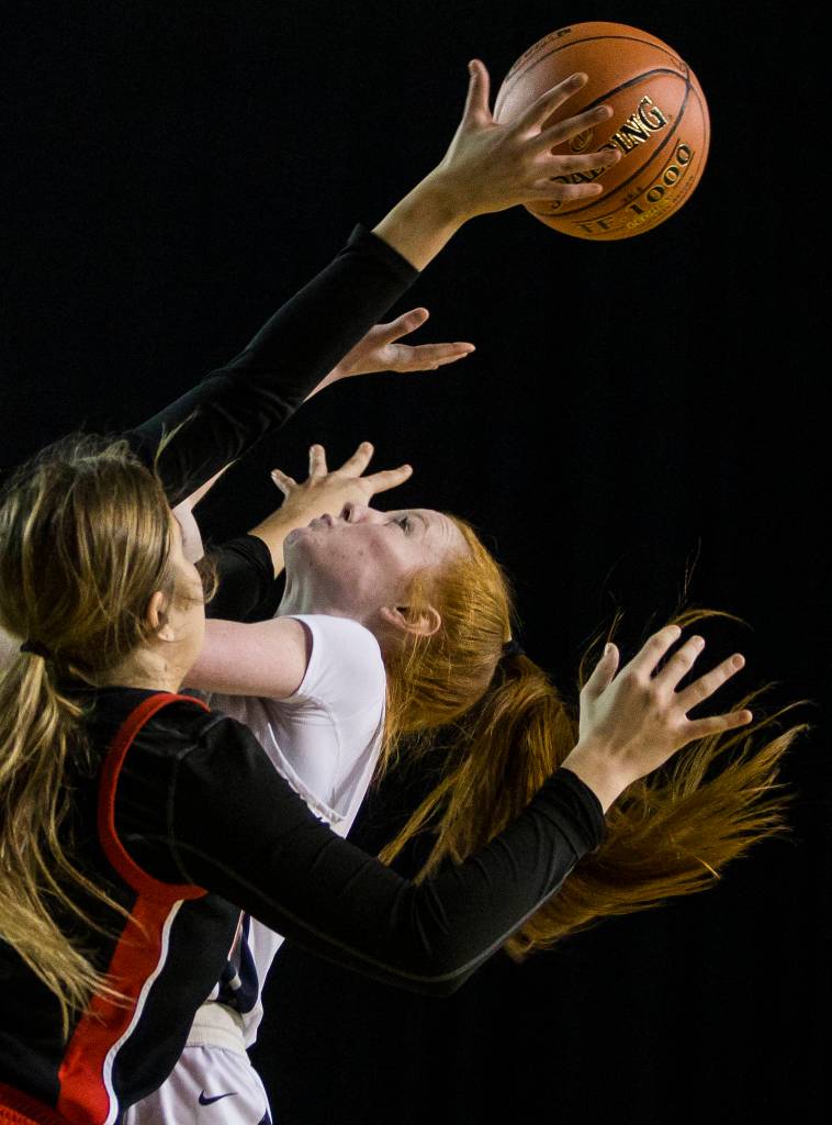 Glacier Peaks Kailyn Allison jumps for the ball during the game against Camas at the Hardwood Classic on Wednesday, March 4, 2020 in Tacoma, Wa. (Olivia Vanni / The Herald)