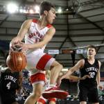 Marysville Pilchucks Brady Phelps attempts to save a loose ball during a 3A boys Hardwood Classic game against Central Kitsap Wednesday morning at the Tacoma Dome. (Kevin Clark / The Herald)