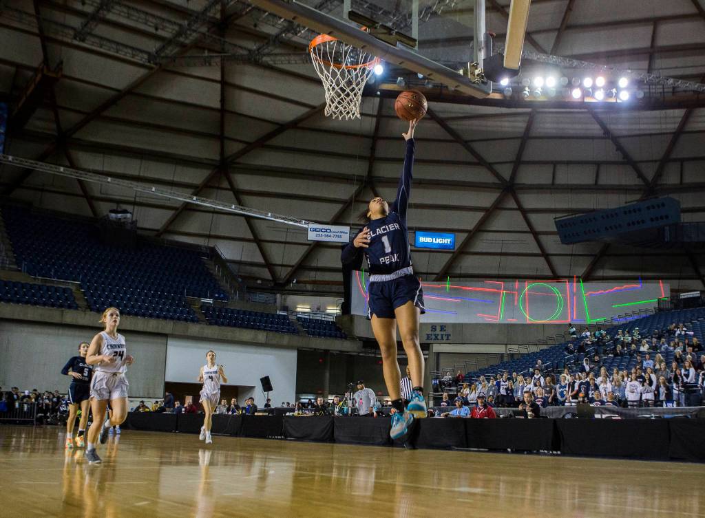 Glacier Peaks Aaliyah Collins makes a layup after stealing the ball during the quarterfinal game against Chiawana at the Hardwood Classic on Thursday, March 5, 2020 in Tacoma , Wa. (Olivia Vanni / The Herald)