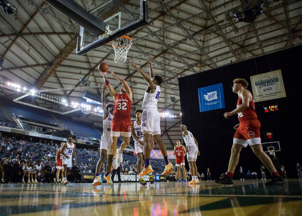Marysville Pilchucks Aaron Kalab makes a layup during a 3A boys Hardwood Classic quarterfinal against Garfield on Thursday in Tacoma. (Olivia Vanni / The Herald)