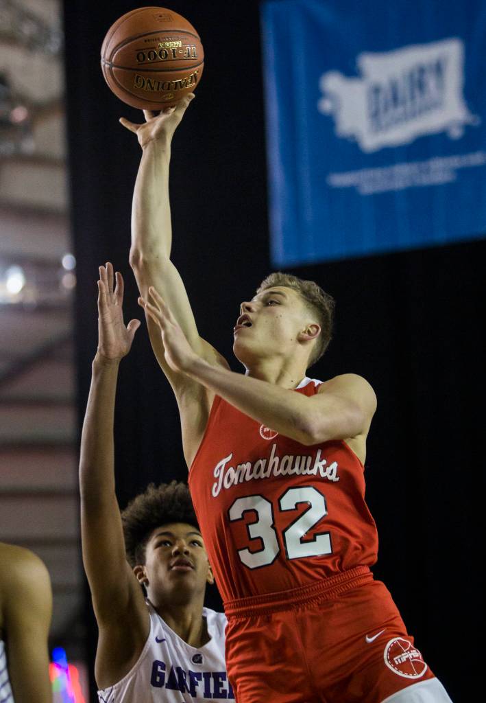 Marysville Pilchucks Aaron Kalab makes a jump shot during a 3A boys Hardwood Classic quarterfinal against Garfield on Thursday in Tacoma. (Olivia Vanni / The Herald)