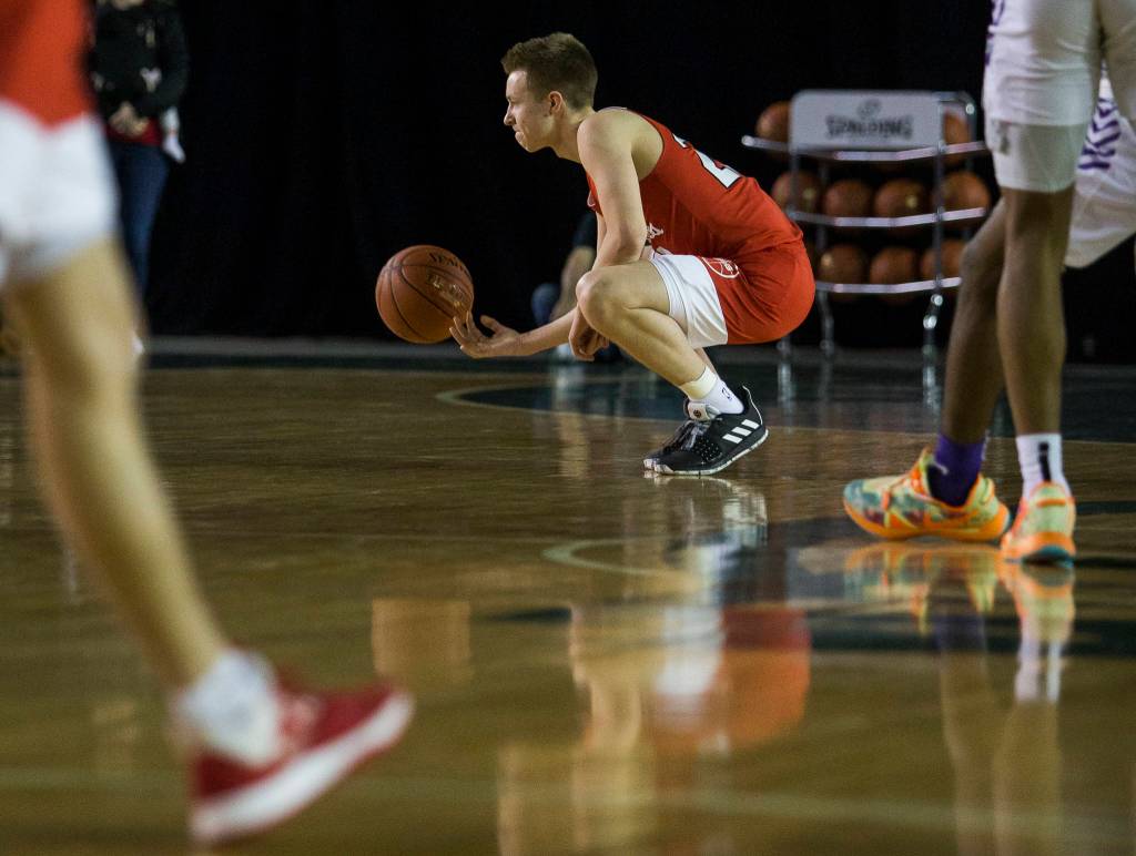 Marysville Pilchucks Luke Dobler gathers himself during during a 3A boys Hardwood Classic quarterfinal against Garfield on Thursday in Tacoma. (Olivia Vanni / The Herald)