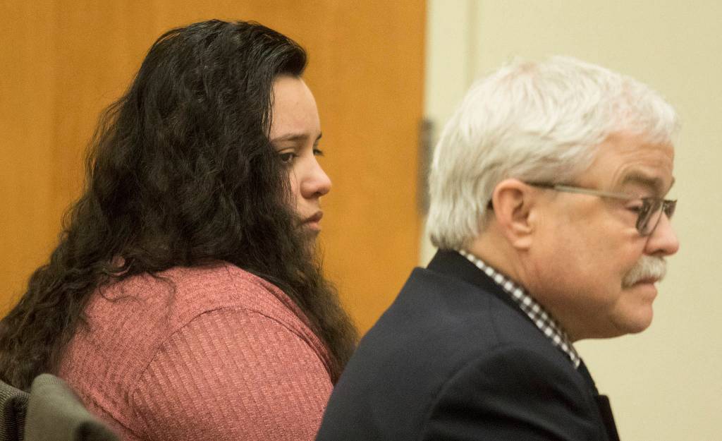 Lendsay Meza listens as a Snohomish County jury announces its verdict Thursday during her trial in Superior Court for the torture-murders of two men in Everett. (Andy Bronson / The Herald)