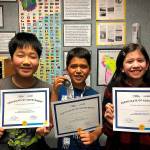 Andy (from left) (Ji-Hoon) Park, Sorin Bulgannawar and Maddy Swanson show their joy over their certificates of achievement.