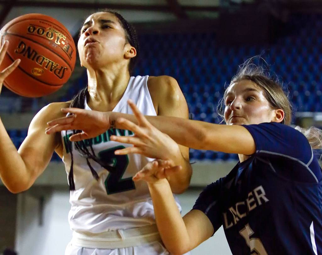 Woodinvilles Veronica Sheffey (left) and Glacier Peaks Shaylin Sande struggle for a loose ball during the semifinals Friday afternoon at the Tacoma Dome on March 6, 2020. Glacier Peak lost 63-41. (Kevin Clark / The Herald)