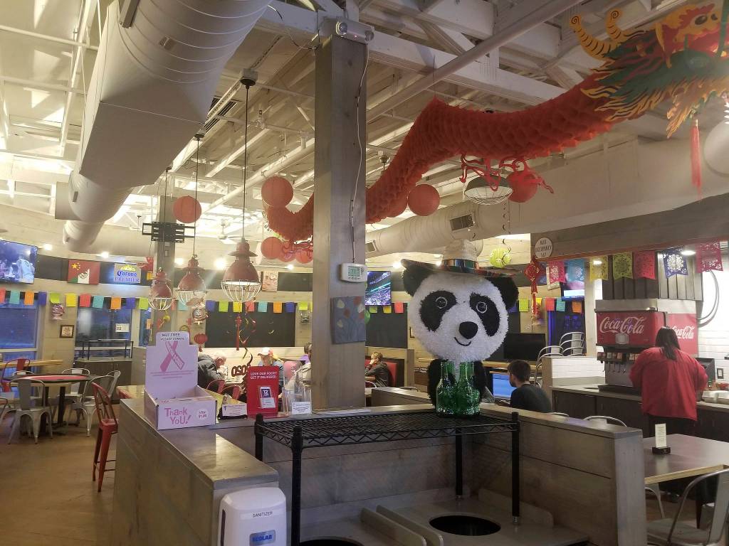 This Feb. 27 photo shows the inside of Panda Libre, an Asian-Mexican fusion restaurant, in Gilbert, Arizona. Getting a trademark for the new name can lead to ugly and sometimes public clashes over ownership and cultural appropriation. (AP Photo/Terry Tang)