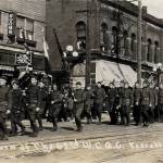 Everett Public Library                                Members of the 63rd Coast Artillery Corps parade past Joe Kings tavern in the 1300 block of Hewitt Avenue on March 12, 1918, after returning from France following the end of World War I. A crowd estimated at 15,000 lined the curbs to meet the soldiers on a warm, breezy and sunny day.