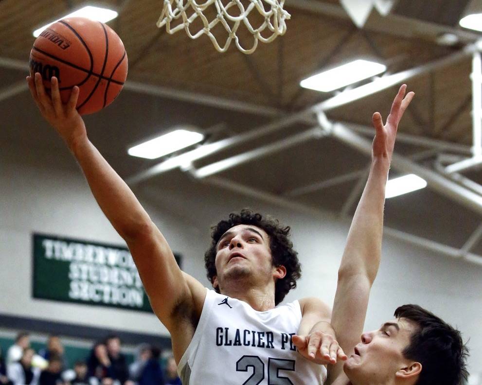 Glacier Peak senior Brayden Quantrille goes for a layup. (Kevin Clark / The Herald)