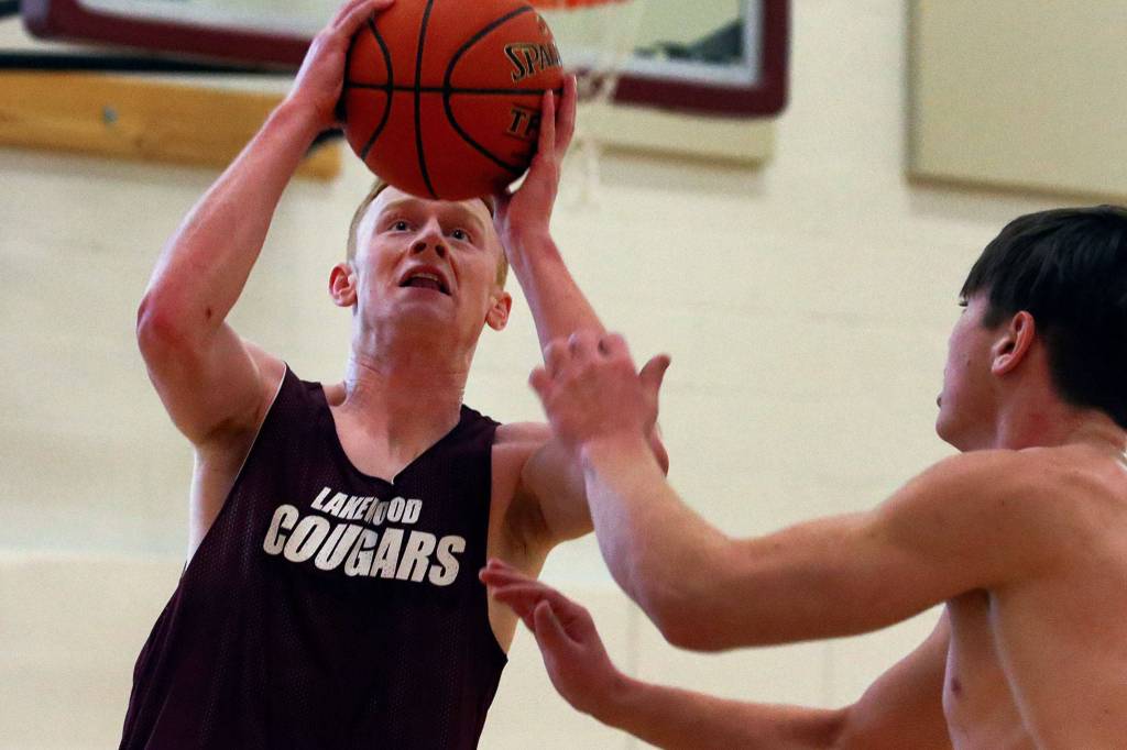 Lakewood senior Alex Jensen rises for a layup. (Kevin Clark / The Herald)