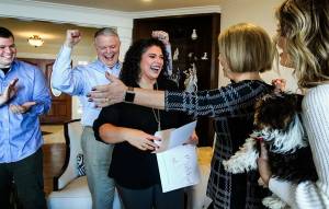 It was Match Day 2020 when fourth-year medical student Claire Murphy (center) learned where shell train for her residency. Because of coronavirus, her family celebrated at home in Everett rather than at the University of Washington. From left: Claires brother Kevin Murphy, her dad Scott Murphy, Claire Murphy, her mom Kippy Murphy, and sister Olivia Murphy. (Dan Bates / The Herald)