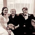 At their wedding, Oct. 31, 2010, Laurie Werner (left) and Peter Jackson pose for a photograph with his mother, Helen Jackson, who died in 2018.