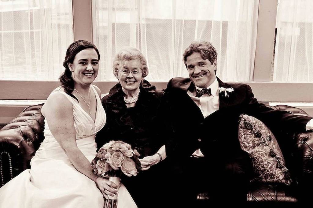 At their wedding, Oct. 31, 2010, Laurie Werner (left) and Peter Jackson pose for a photograph with his mother, Helen Jackson, who died in 2018.