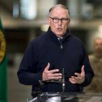 Gov. Jay Inslee discusses the deployment of a field hospital at CenturyLink Field Event Center on Saturday in Seattle. (Amanda Snyder/The Seattle Times via AP, Pool)