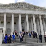 Members of the House of Representatives walk down the steps of Capitol Hill in Washington, Friday, after passing a coronavirus rescue package. Acting with exceptional resolve in an extraordinary time, the House rushed President Trump a $2.2 trillion rescue package Friday, tossing a life preserver to a U.S. economy and health care system left flailing by the coronavirus pandemic. (Susan Walsh / Associated Press)
