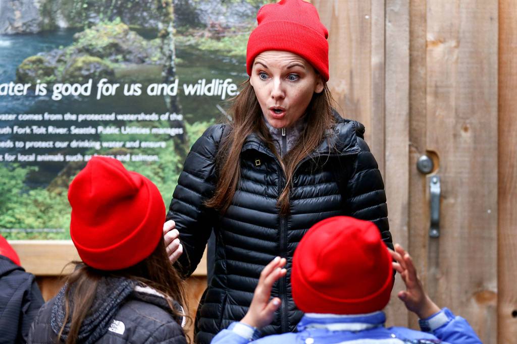 Jennie Warmouth led her class of second graders on a tour of the zoo, which also included views of wolves and elk. (Kevin Clark / The Herald)