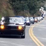 Several members of the Modern Mopars of Snohomish County club motor up Chuckanut Drive during a group cruise in March. It was the clubs last organized gathering before the governors order for people to stay home. (Modern Mopars of Snohomish County)