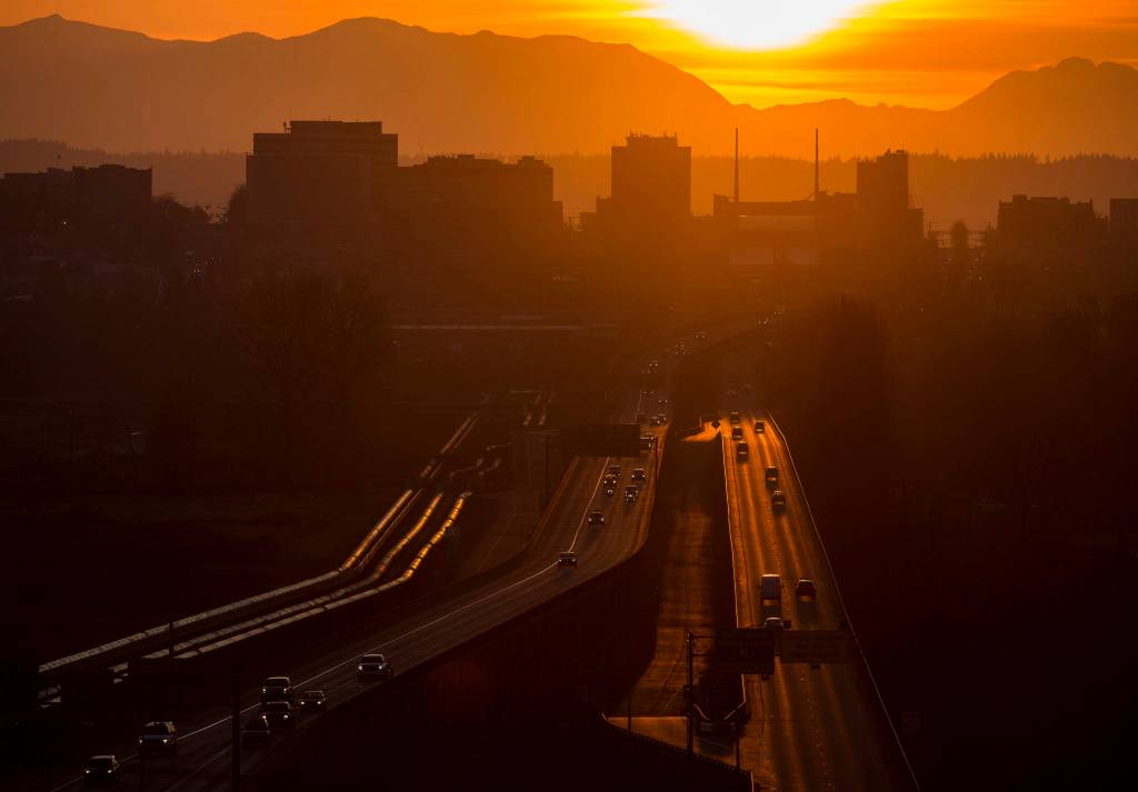 A steady flow of traffic moves along U.S. 2 on March 21 despite Everett Mayor Cassie Franklins stay-home directive given on March 20 to all of Everetts residents. (Olivia Vanni / The Herald)