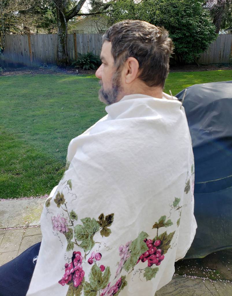 Rich Dennis before a home haircut by his wife, Ardelle. She watched a YouTube tutorial and used his beard trimmers. (Photo by Ardelle Dennis)