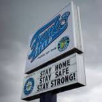 The Funko Field sign displays the phrase, stay home stay safe stay strong! Friday in Everett. (Olivia Vanni / The Herald)