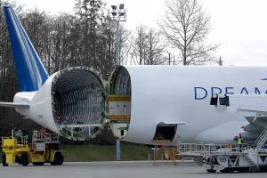 Boeing to offer buyouts, weighs wide-body production cuts