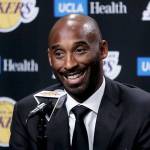 Former Los Angeles Laker Kobe Bryant talks during a news conference in Los Angeles on Dec. 18, 2017. Bryant and fellow NBA greats Tim Duncan and Kevin Garnett headlined a nine-person group announced Saturday. (AP Photo/Chris Carlson, File)