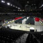 The main rink at at the Angel of the Winds Arena, seen here March 31, was converted into a COVID-19 isolation and quarantine site in Everett. Both ice rinks are now set up for those who need to quarantine and isolate due to work risks or lack of shelter. (Andy Bronson / The Herald)