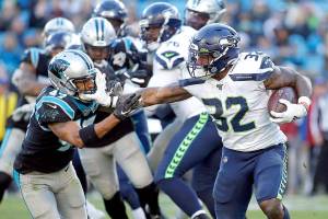 Should the Seattle Seahawks target running back, where Chris Carson had a Pro Bowl-caliber 2019 but saw his season ended by injury, in the upcoming NFL draft? (AP Photo/Brian Blanco)