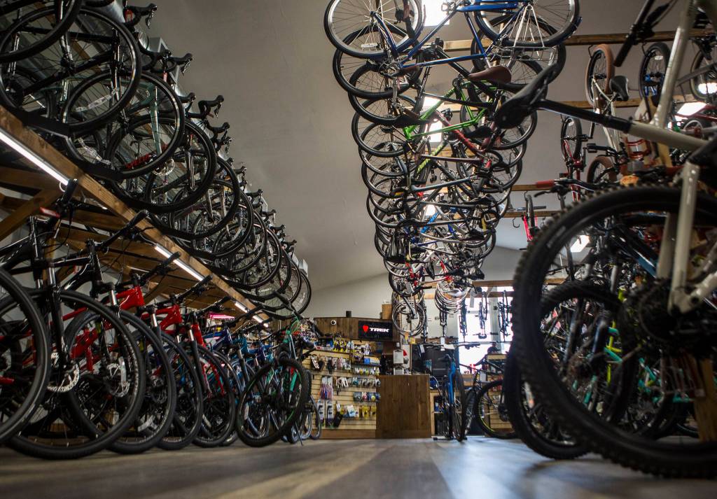 Bikes line the floors, wall and hang from the celling at the Bicycle Centres of Snohomish on Saturday in Snohomish. (Olivia Vanni / The Herald)