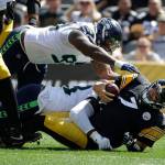 Steelers quarterback Ben Roethlisberger (7) is sacked by Seahawks defensive end Rasheem Green (98) in the first half of a game Sept. 15, 2019, in Pittsburgh. (AP Photo/Gene J. Puskar)
