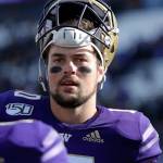 Washington quarterback Jacob Eason, a Lake Stevens alum, stands on the field after a game against Southern Cal on Sept. 28, 2019, in Seattle. (AP Photo/Elaine Thompson)