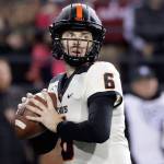 Oregon State quarterback Jake Luton, a Marysville Pilchuck alum, looks for a receiver during a game against Washington State on Nov. 23, 2019, in Pullman. (AP Photo/Ted S. Warren)