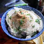 Hummus, a creamy Middle Eastern dip made with chickpeas and tahini paste, is perfect for mindless dipping. (Gretchen McKay/Pittsburgh Post-Gazette)