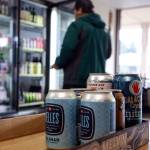 Trip Ramos shops the selection at The Republic Bottleshop in Marysville. (Kevin Clark / The Herald)